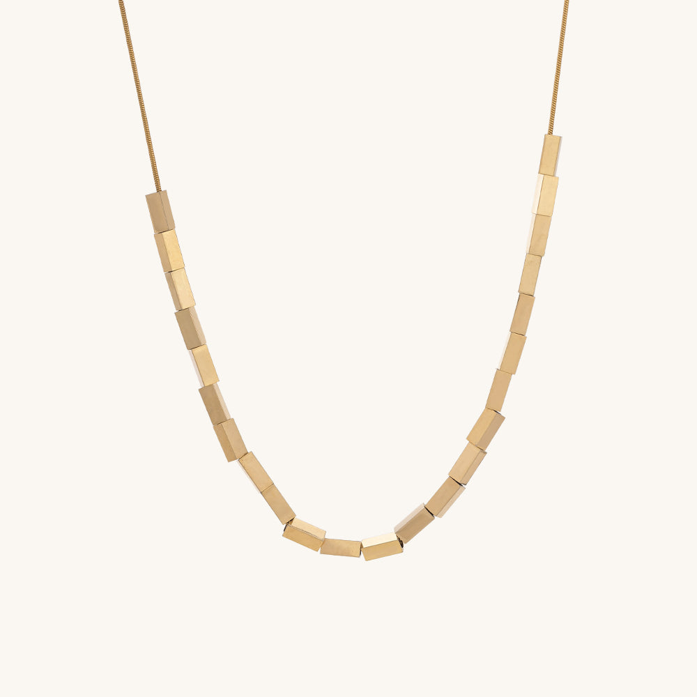 Short 18k gold polished chain with box charms